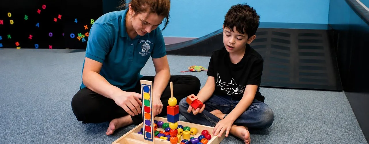 Fine motor delays pediatric occupational therapy at Synergy Therapeutic Group — therapy for grip, handwriting, dressing, and hand-skill development in children in Carbondale, IL